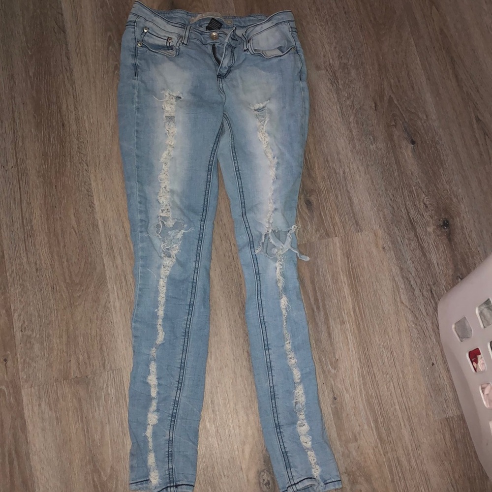 light wash super ripped jeans